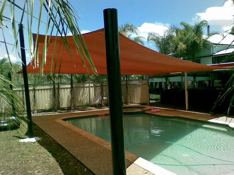 Shade sail over pool in Perth home.