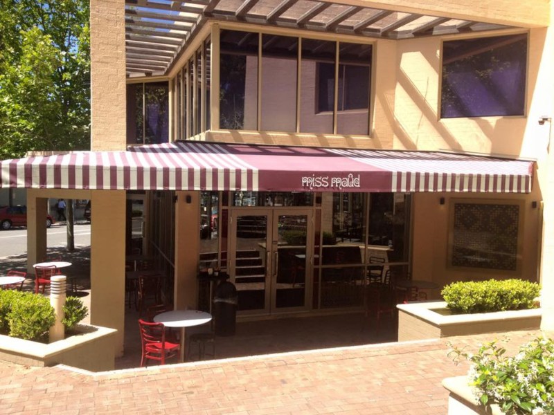 Commercial fixed awning installation.
