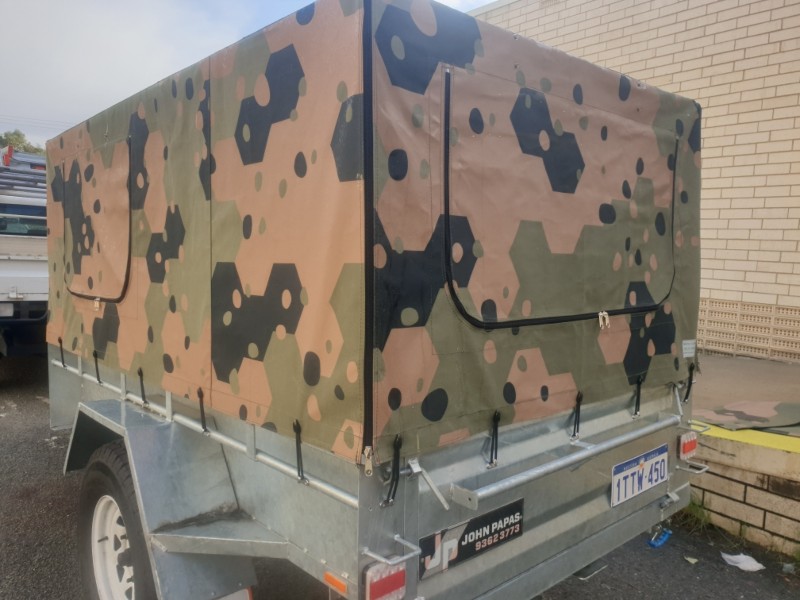 Custom camo trailer canvas closed.