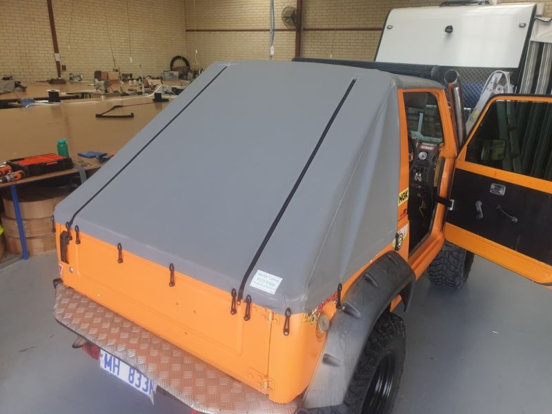 Custom grey ute canopy made to suit layout of ute.