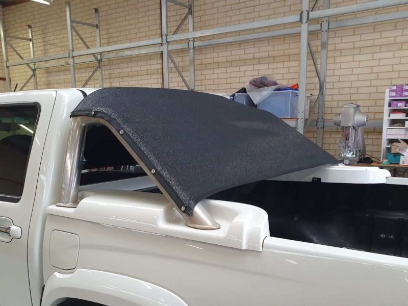 Shade sail ute tonneau cover for dogs and pets.