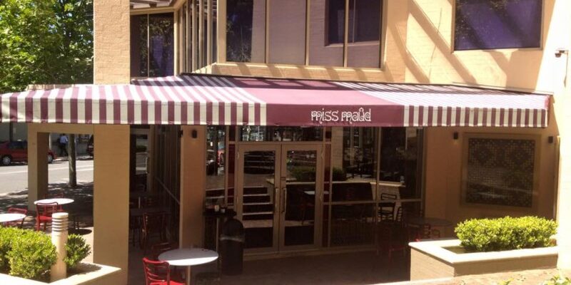 Commercial fixed awning installation.