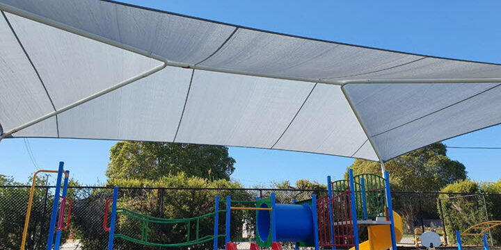 Gale Pacific commercial dualshade 350 over playground