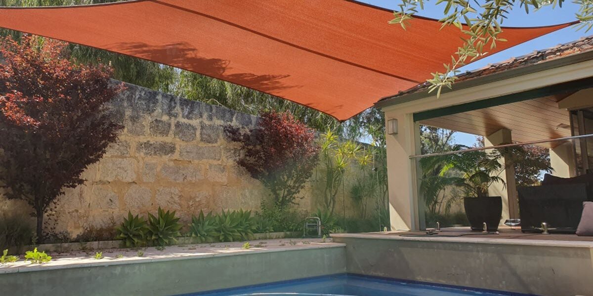 Swimming pool shade sail in Perth home.